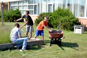 Volunteers help clean up Gilbert Elementary School in Gwinn