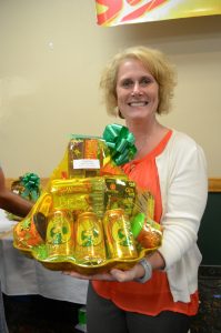 Kay Ryan from Gwinn with her $100 value gift basket from Super One Foods