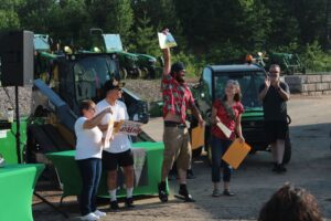 He won a John Deere riding mower!