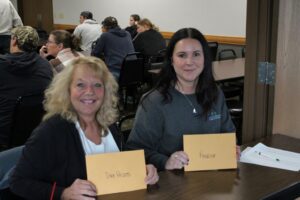 Cheri and Amy made sure everyone got a ticket!